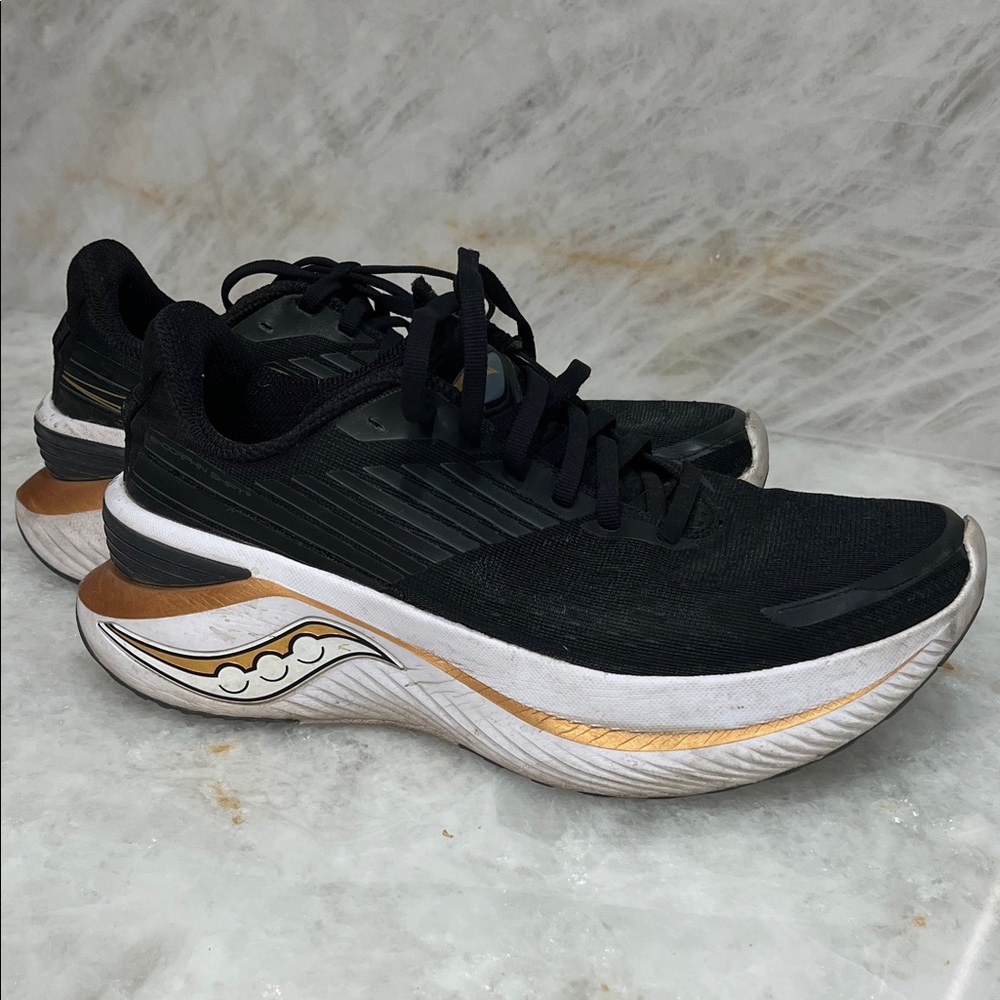Saucony Black and Gold Athletic Shoes
